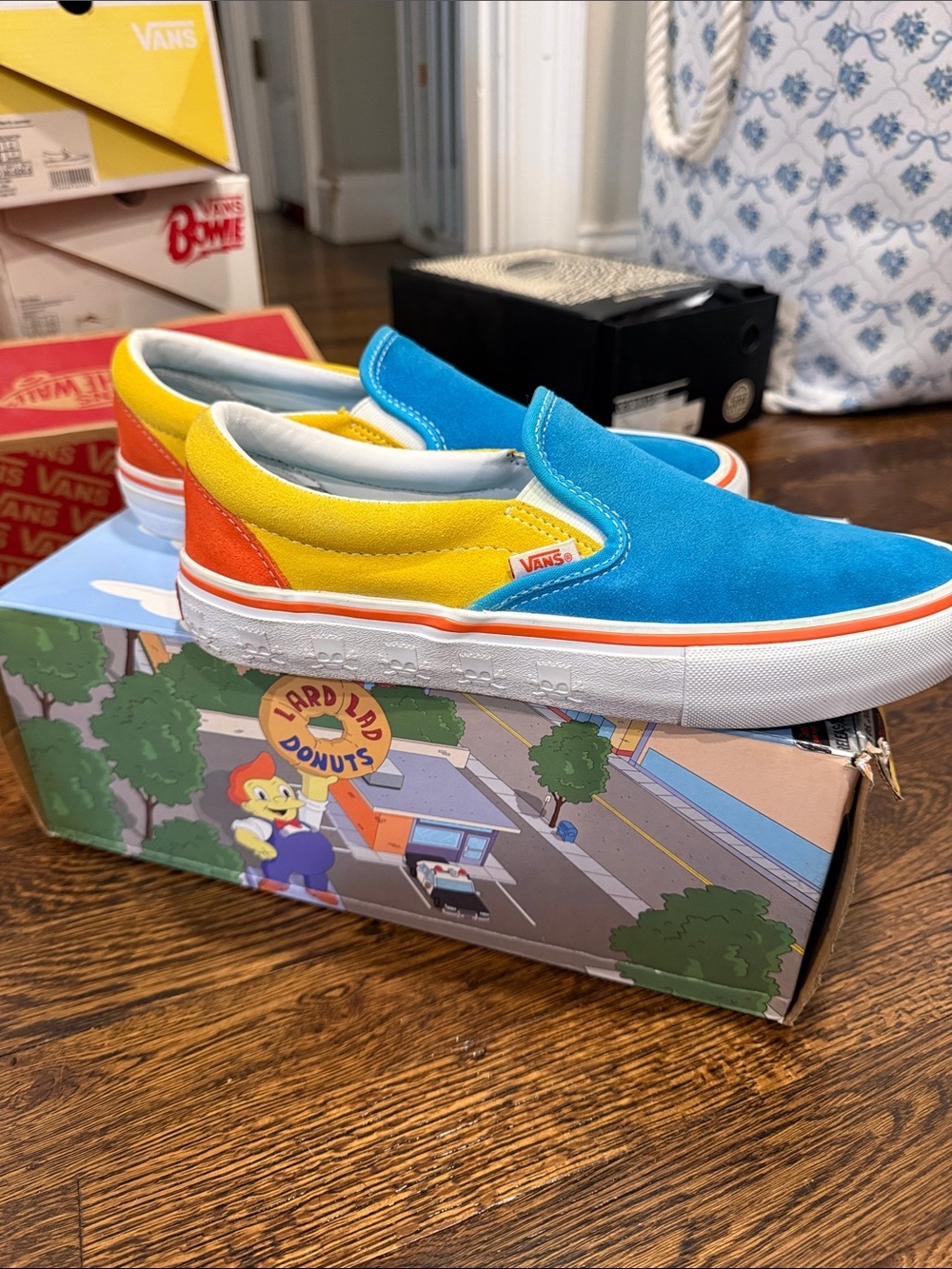 Vans Slip-On Sneakers in Bright Blue, Yellow & Orange Simpson collection